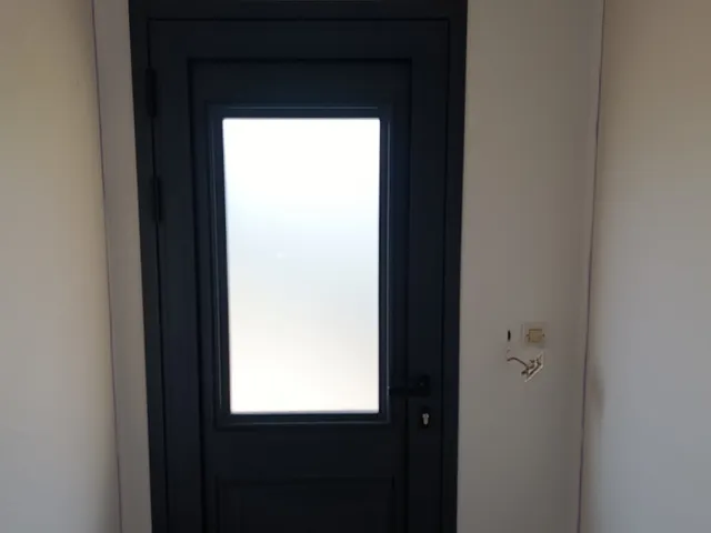 Remplacement d'une porte d'entrée en aluminium à Cazères